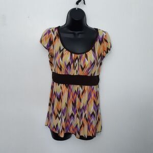 B Wear multicolored blouse